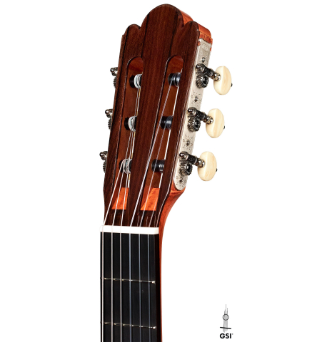 The headstock of a Wolfgang Jellinghaus “Torres 49 - ex Tarrega” classical guitar made of spruce and maple