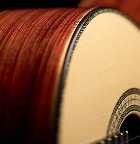 The soundboard and side of a Wolfgang Jellinghaus "1912 Ex-Segovia" classical guitar made of spruce and Pau Ferro.