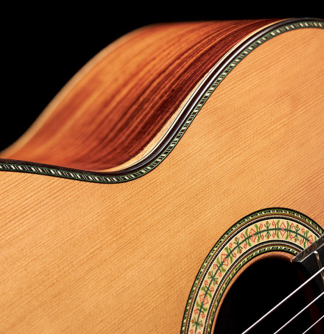 The soundboard and side of a Wolfgang Jellinghaus "1912 Ex-Segovia" classical guitar made of cedar and Pau Ferro.