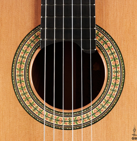 The rosette of a Wolfgang Jellinghaus "1912 Ex-Segovia" classical guitar made of cedar and Pau Ferro.