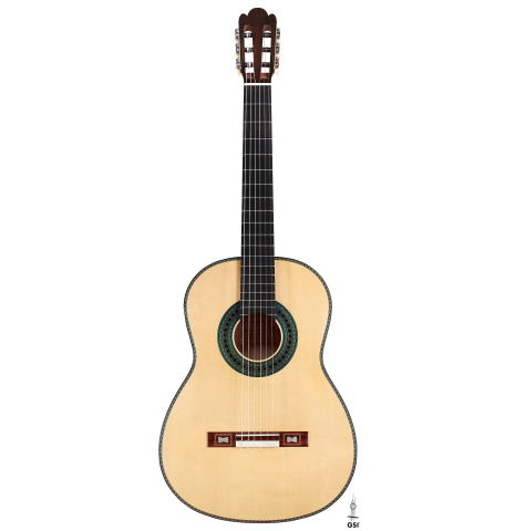 The front of a Wolfgang Jellinghaus “Torres 43 - clear” classical guitar made with spruce and maple.