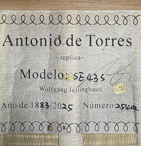 The label of a Wolfgang Jellinghaus “Torres 43” classical guitar made of spruce and maple and clear finish
