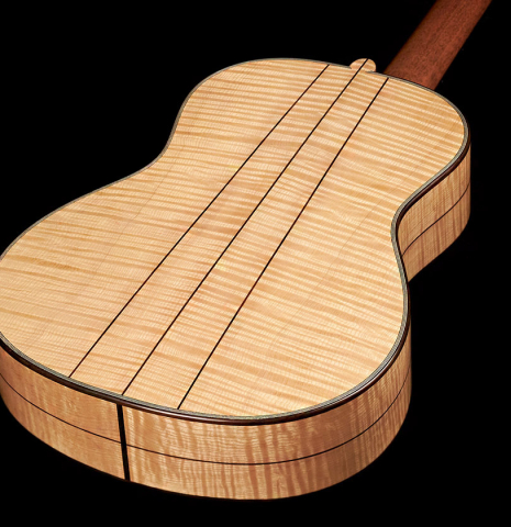 The back and sides of a Wolfgang Jellinghaus “Torres 49 - clear - ex Tarrega” classical guitar made of spruce and maple