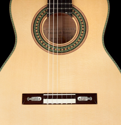 The front of a Wolfgang Jellinghaus “Torres 49 - clear - ex Tarrega” classical guitar made of spruce and maple