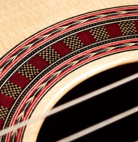 This is the rosette and soundboard of a 2023 Wolfgang Jellinghaus "Espanola A" classical guitar with spruce top and Indian rosewood back and sides