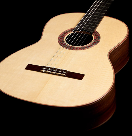 This is the soundboard, binding and rosette of a 2023 Wolfgang Jellinghaus "Espanola A" classical guitar with spruce top and Indian rosewood back and sides