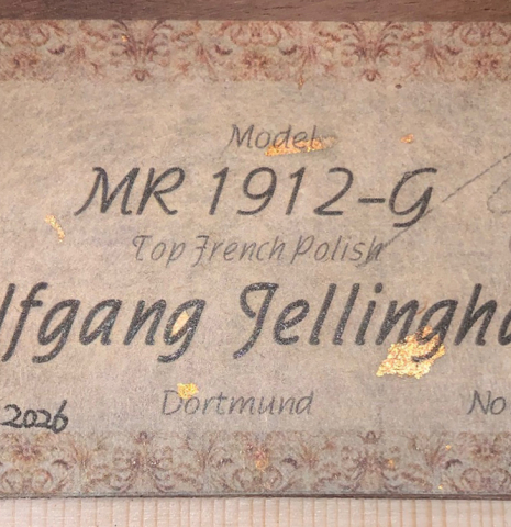 The label of a Wolfgang Jellinghaus "1912 Ex-Segovia" classical guitar made of cedar and granadillo.