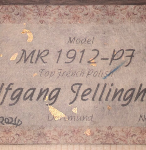 The label of a Wolfgang Jellinghaus "1912 Ex-Segovia 640" classical guitar made of cedar and Pau Ferro.