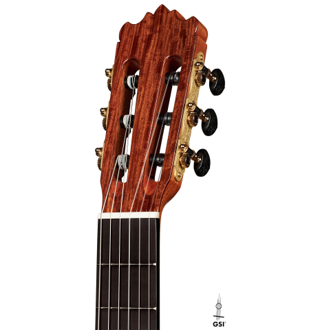 The headstock of a Wolfgang Jellinghaus "1912 Ex-Segovia 640" classical guitar made of cedar and Pau Ferro.