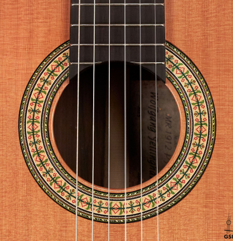 The rosette of a Wolfgang Jellinghaus "1912 Ex-Segovia 640" classical guitar made of cedar and Pau Ferro.