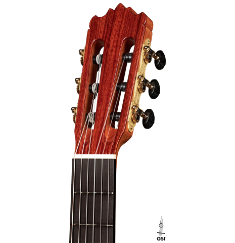 The headstock of a Wolfgang Jellinghaus "1912 Ex-Segovia" classical guitar made of spruce and granadillo.