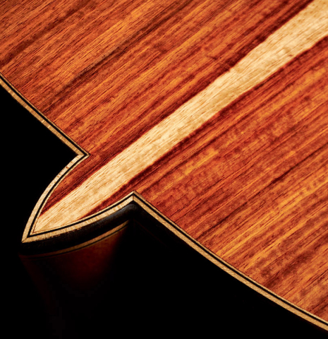 Closeup of the heel and back of a Wolfgang Jellinghaus "1912 Ex-Segovia" classical guitar made of spruce and granadillo.