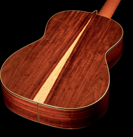 The back and sides of a 2023 Wolfgang Jellinghaus "1912 Ex-Segovia 640" classical guitar made of spruce and granadillo.