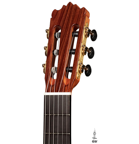 The headstock of a 2023 Wolfgang Jellinghaus "1912 Ex-Segovia 640" classical guitar made of spruce and granadillo.