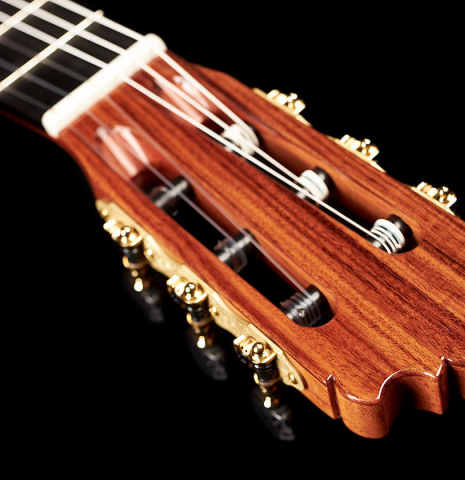 The headstock and tuning machines of a Wolfgang Jellinghaus "1912 Ex-Segovia" classical guitar made of cedar and granadillo.