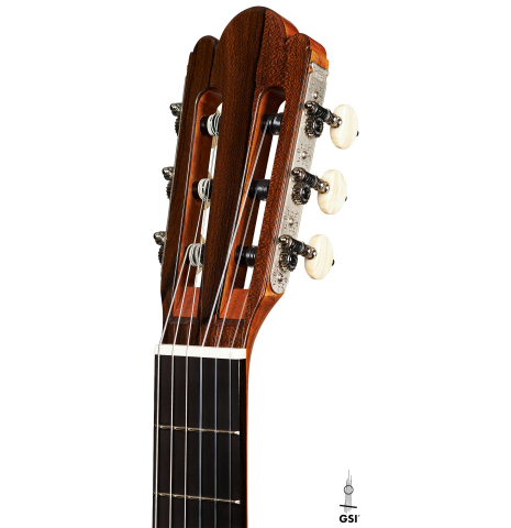 The headstock of a Wolfgang Jellinghaus “Torres FE 13 - clear” classical guitar made with spruce and Indian rosewood