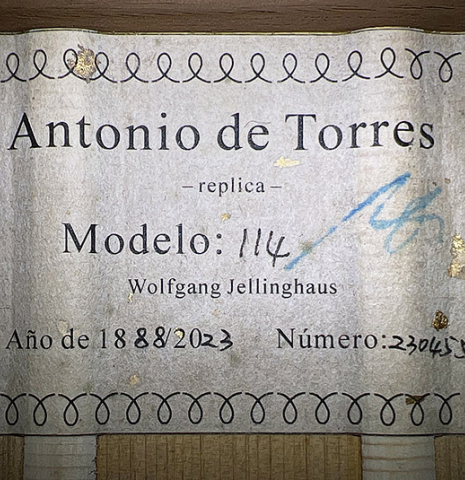 The label of a 2023 Wolfgang Jellinghaus “Torres 114 - ex Tarrega” classical guitar made of spruce and cypress