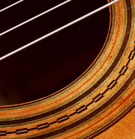Closeup detail of the rosette of a 2023 Wolfgang Jellinghaus “Torres 114 - ex Tarrega” classical guitar made of spruce and cypress
