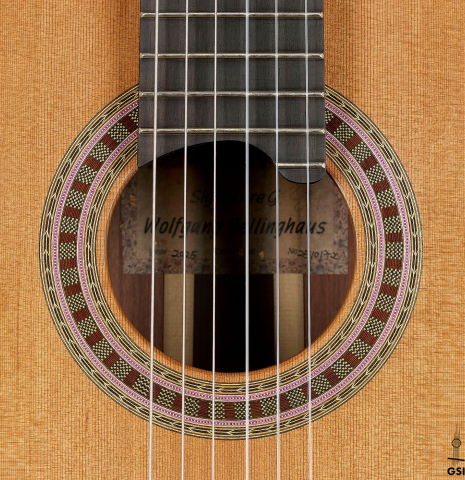 The rosette of a Wolfgang Jellinghaus "Signature CD/SP 640" classical guitar made of cedar and Granadillo