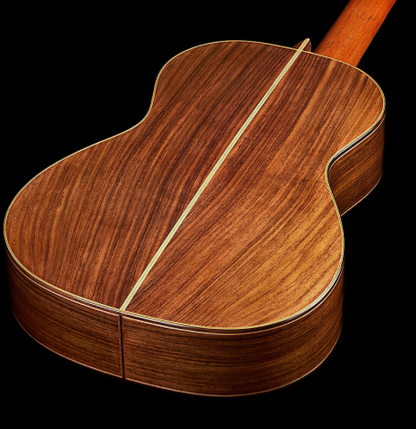 The back and sides of a Wolfgang Jellinghaus “Torres FE 13” classical guitar with antiqued finish, made of spruce and Indian rosewood