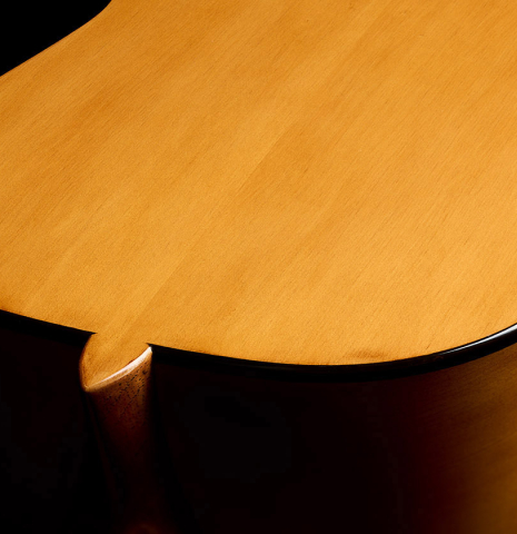 The heel, back binding and purfling of a Wolfgang Jellinghaus "Torres SE 02" classical guitar made with spruce and cypress