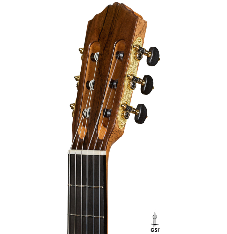 The headstock of a Wolfgang Jellinghaus "1912 Ex-Segovia 640" classical guitar made of spruce and maple