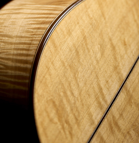 The flamed maple used on a Wolfgang Jellinghaus "1912 Ex-Segovia 640" classical guitar made of spruce and maple