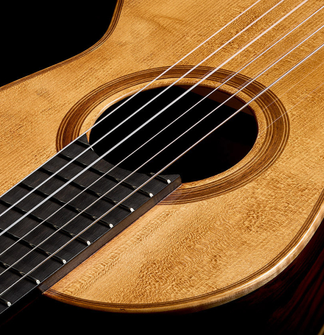 View of the top and rosette from the fingerboard of a Wolfgang Jellinghaus "Torres SE 77" classical guitar made of spruce and ziricote
