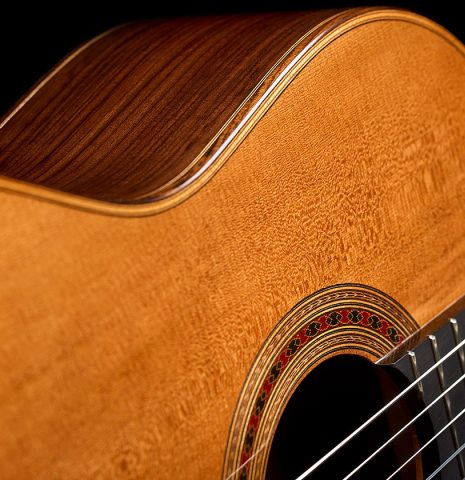 The soundboard and side of a Wolfgang Jellinghaus "Friederich - aged" classical guitar made of cedar and Indian rosewood