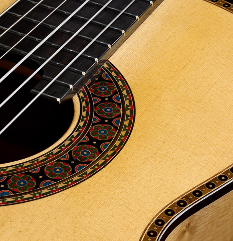 The top, rosette and purfling of a 2026 Federico Jiang "Arias" classical guitar made of spruce and maple