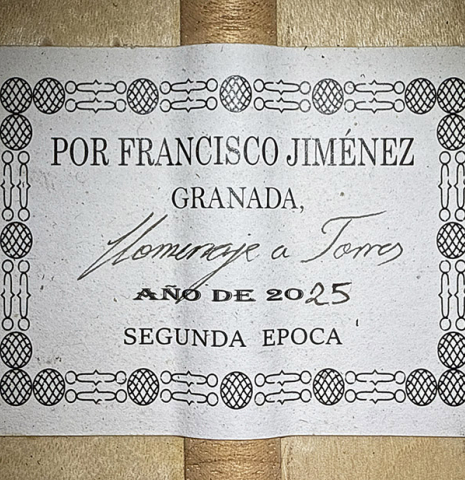 The label of a 2025 Francisco Jimenez "Torres" classical guitar made of spruce and maple