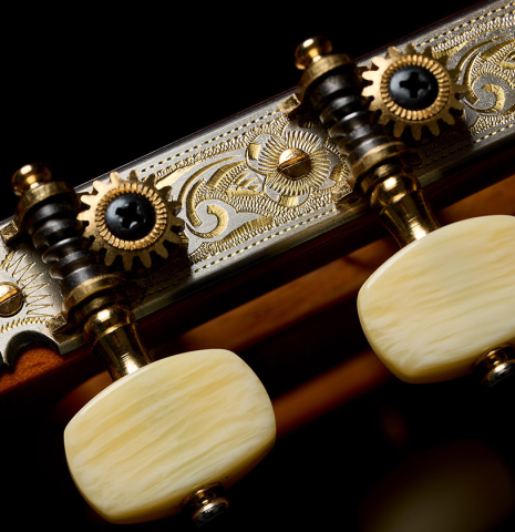 The tuning machines of a 2025 Francisco Jimenez "Torres" classical guitar made of spruce and maple