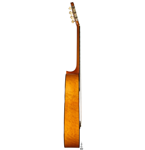 The side of a 2025 Francisco Jimenez "Torres" classical guitar made of spruce and maple