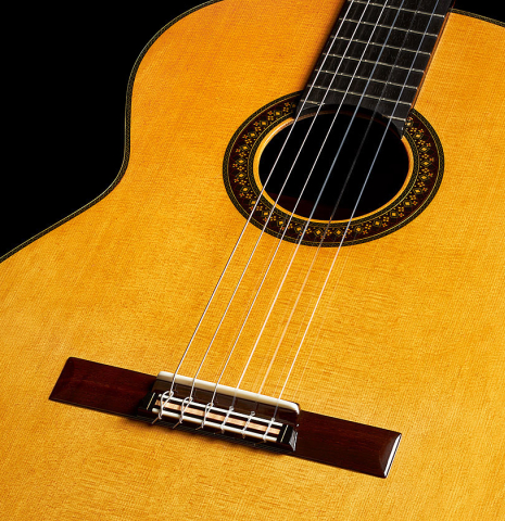 The soundboard of a 2023 So Kimishima “Stella” classical guitar made with cedar and Indian rosewood