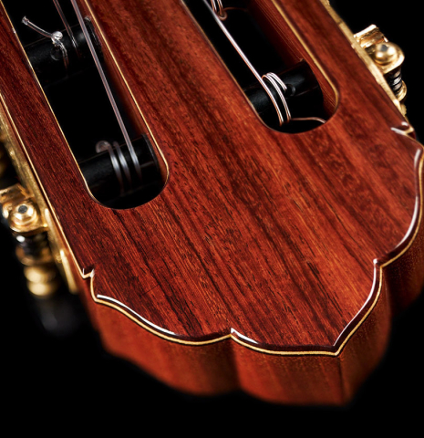 The headstock and tuning machines of a 2023 So Kimishima “Stella” classical guitar made with spruce and Indian rosewood