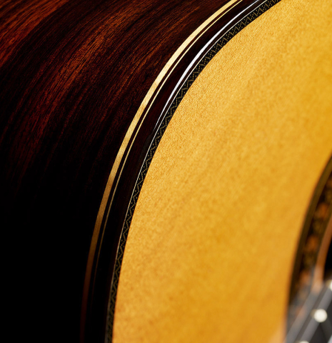 The soundboard, top binding and purflings of a 2024 So Kimishima “Stella” classical guitar (ex Shin-Ichi Fukuda) made of cedar and Indian rosewood