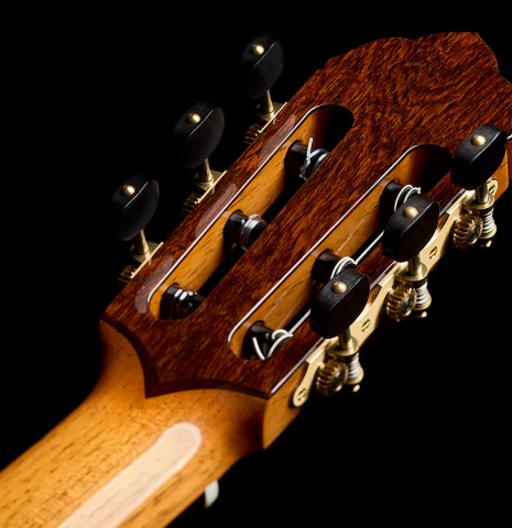 The veneer on the back of the headstock of a 2026 So Kimishima “Luna” classical guitar made of cedar and African rosewood
