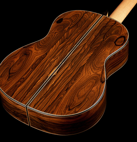 The back and sides of a 2025 Evan Kingma classical guitar made of spruce and ziricote