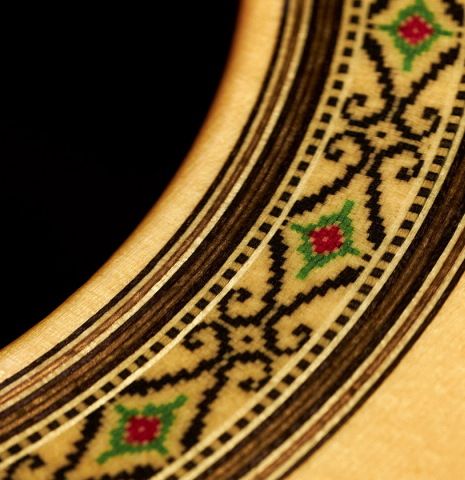 Detail of the rosette of a 2023 Sakurai-Kohno "Professional-J" classical guitar made with spruce and CSA rosewood.