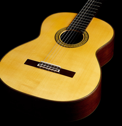The soundboard of a 2024 Sakurai-Kohno "Professional-J" classical guitar made with spruce and African rosewood.