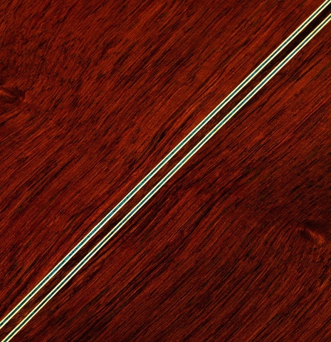 The back center seam of a 2025 Sakurai-Kohno "Professional-J" classical guitar made of cedar and African rosewood
