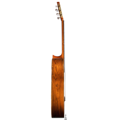 This is the side of a 1987 Masaru Kohno &quot;Professional-J&quot; classical guitar with pickup on a white background