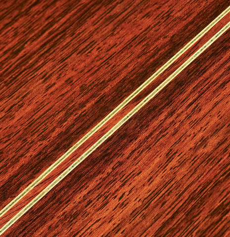 A close-up of the back of a 1982 Masaru Kohno &quot;Concert&quot; classical guitar made of spruce and Indian rosewood