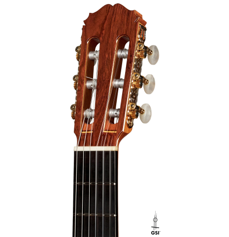 The headstock of a 2009 Sakurai-Kohno "Professional-J" classical guitar made of cedar and CSA rosewood on a white background