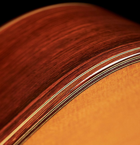 The sides, purfling and top of a 2009 Sakurai-Kohno "Professional-J" classical guitar made of cedar and CSA rosewood