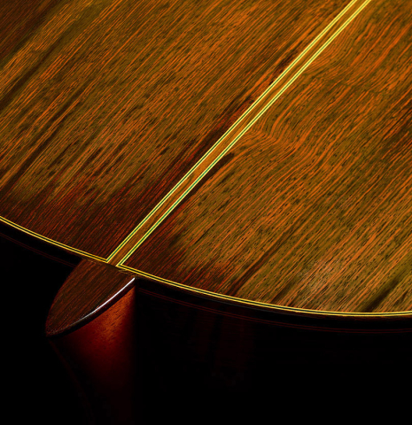 The heel, back binding and purfling of a 1981 Masaru Kohno "30" classical guitar made of spruce and CSA rosewood