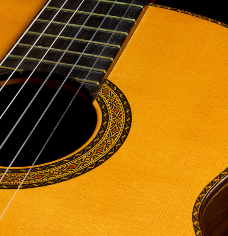 The soundboard of a 1981 Masaru Kohno "30" classical guitar made of spruce and CSA rosewood