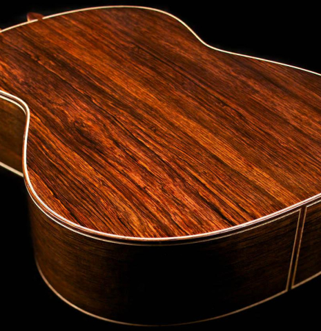 The back and sides of a 2015 Zoran Kuvac classical guitar made with cedar and African rosewood