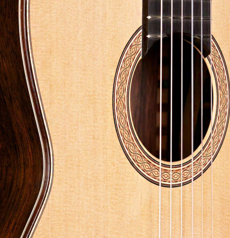 The front and side of a 2015 Zoran Kuvac classical guitar made with cedar and African rosewood
