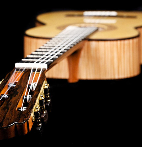 The headstock and neck of a La Cañada "Model 17" classical guitar made of spruce and maple